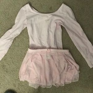 Long sleeve dance leotard with skirt.